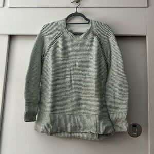 Guc blue heather soft sweater with sparkly detail. Sleeping on snow